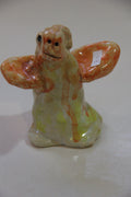 Boneco alado